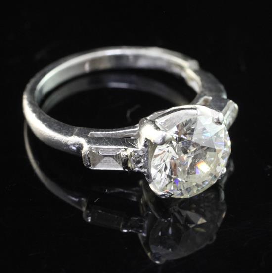 A 20th century platinum and single stone diamond ring, size K.